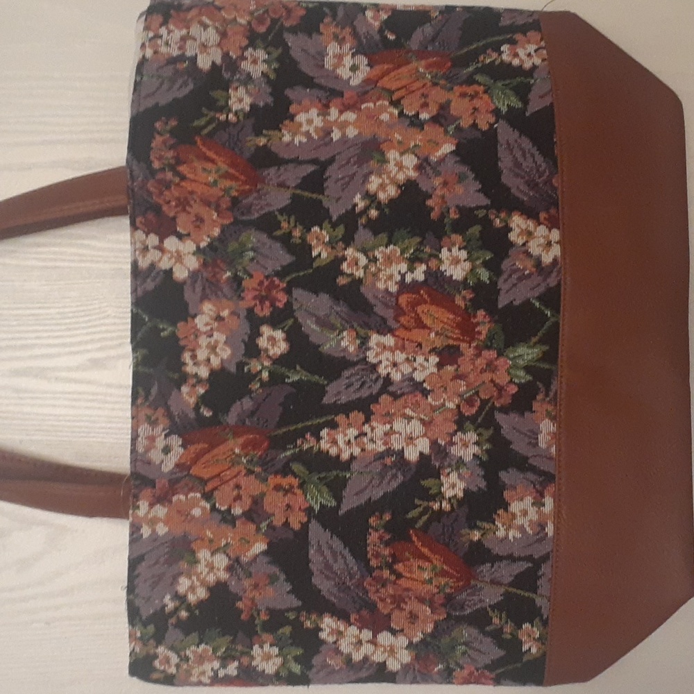 Black floral faux leather and jute tote bag.